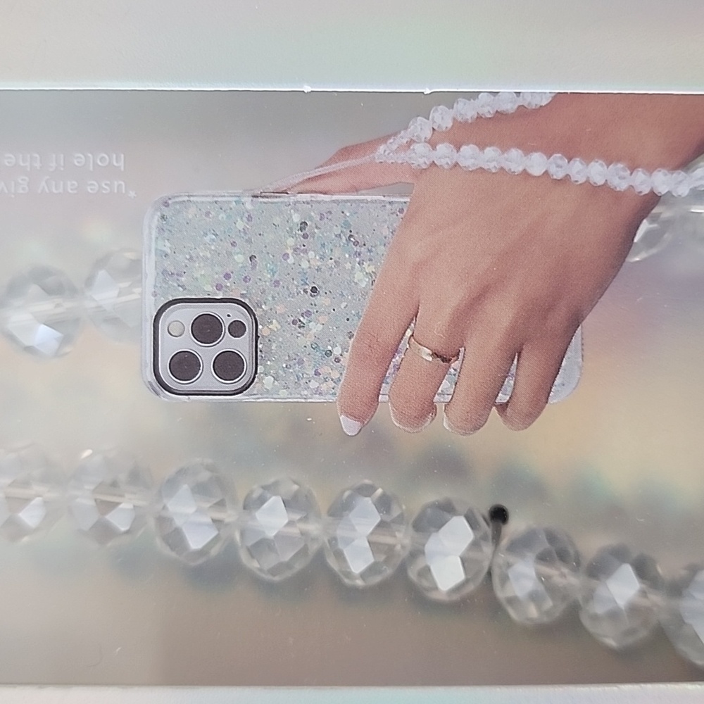 Beautiful crystal phone wristlet, attaches to most phone cases.